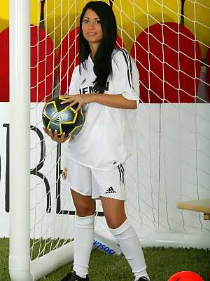 Football playing girl with dark hair Radka N strips to socks and cleats in net