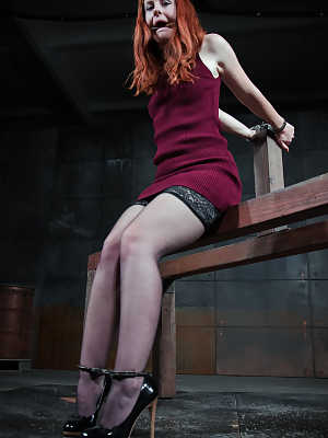 Natural redhead Barbary Rose is subjected to humiliating abuse in a dungeon