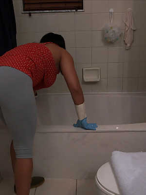 Puerto Rican MILF Becca Diamond shows her hot booty while cleaning bottomless