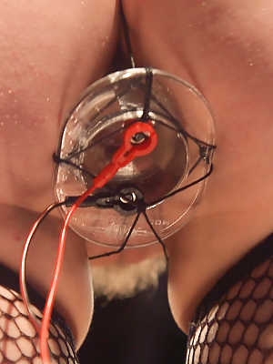 Lesbian MILF Bella Rossi subjecting her BDSM sex slave to electrical torture