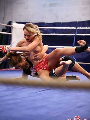 Hot fighter babes Debbie White & Blue Angel licking shaved pussy in the ring