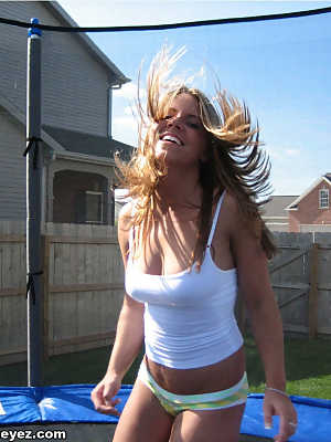 Amateur girl bounces on a trampoline in her undies and a spaghetti strap shirt