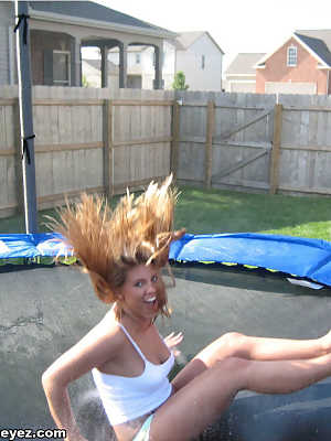 Amateur girl bounces on a trampoline in her undies and a spaghetti strap shirt