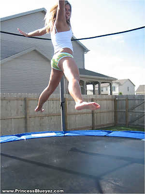 Amateur girl bounces on a trampoline in her undies and a spaghetti strap shirt