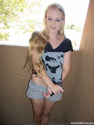 Young amateur Bri Skies exposes herself out on the balcony of her condo