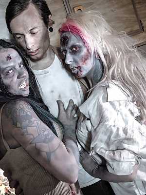 Fetish models Brittany Lynn and Jessie Lee giving head in Zombie threesome