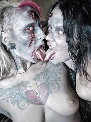 Fetish models Brittany Lynn and Jessie Lee giving head in Zombie threesome