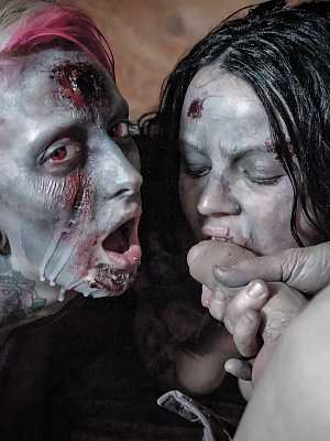 Fetish models Brittany Lynn and Jessie Lee giving head in Zombie threesome