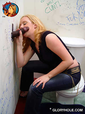 Blonde 39yo Fiona Cheeks tastes black dong through a gloryhole in the toilet