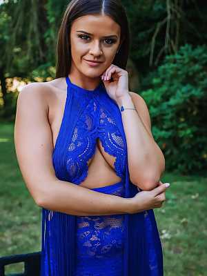 Beautiful girl Brook Wright releases her natural tits from an elegant dress