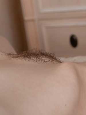 Babe Marceline Moore massages her incredible tits & shows her furry holes