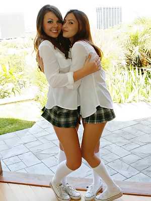 Sexy lesbian students Cali Cassidy & Cassie pose topless in school uniform