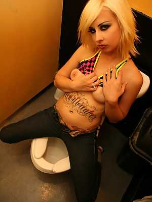 Inked prostitute Cali Nova blows and fucks a strong dick in the public toilet