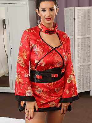 Fantastic MILF Cara Ruby removes her geisha outfit and reveals huge tits