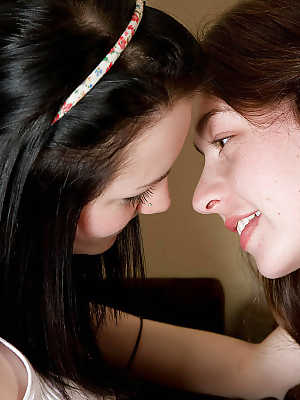 Young girls Carly T and Keilyn share tongue kiss and go full on lesbian