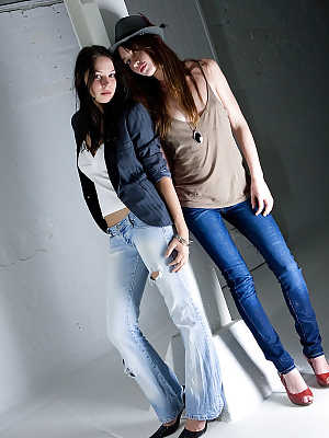 Teen girls Carly T and Rebekah strip off ripped denim jeans to model nude