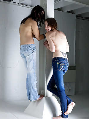 Teen girls Carly T and Rebekah strip off ripped denim jeans to model nude