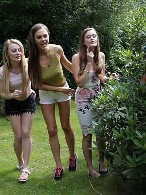 Three hotties please a horny voyeur by the side of a private lake