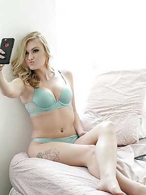 Teen babe Jessie Young caught taking lingerie self shots by voyeur