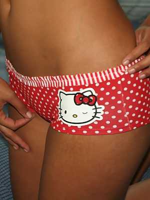 Asian amateur Cat Xoxo slips cute panties over her perfect ass on a bed