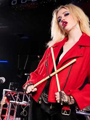 Two rival rock bands, Twisted Fister, led by Micki Jett Charlotte Stokely and