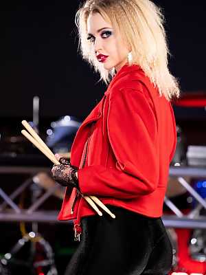 Two rival rock bands, Twisted Fister, led by Micki Jett Charlotte Stokely and