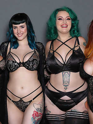 Fatty Lucy Vixen and her busty inked friends pose topless in lingerie