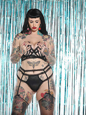 Hot Cherrie Pie peels off her strappy lingerie to show her thick tattooed body