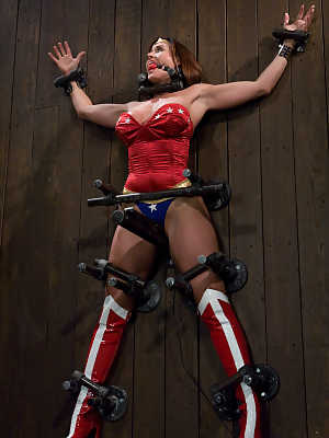 Wonder Woman Christina Carter	gets stripped and has her big tits tortured