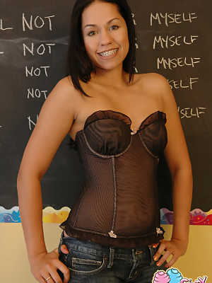 Latina teen Cindy Cupcakes exposes her tight ass in front of a chalkboard