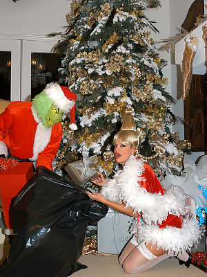 Big boobed blonde chick gets banged by the Grinch in a Santa suit at Christmas