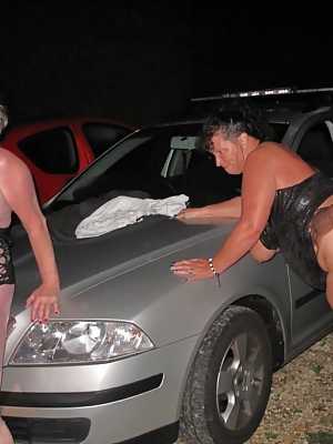 Overweight mature women take part in group sex over car bonnets