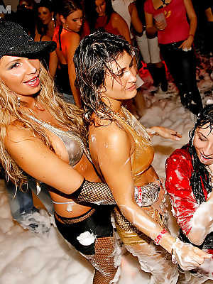 Slutty babes getting blowbanged and fucked hardcore at the foam sex party