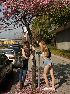 Teenage vixens Riley Anne & Winter Bliss flash their hot booties in public