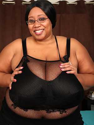 Brunette BBW in black lingerie Cotton Candi exposing her massive saggy tits