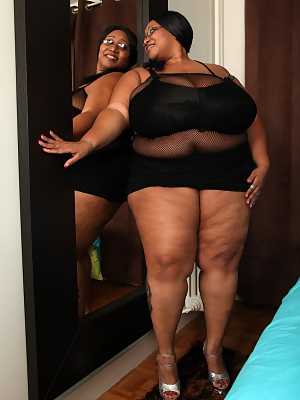 Brunette BBW in black lingerie Cotton Candi exposing her massive saggy tits