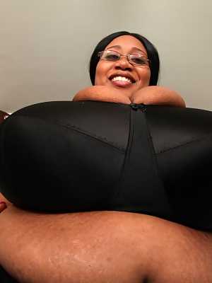 Brunette BBW in black lingerie Cotton Candi exposing her massive saggy tits