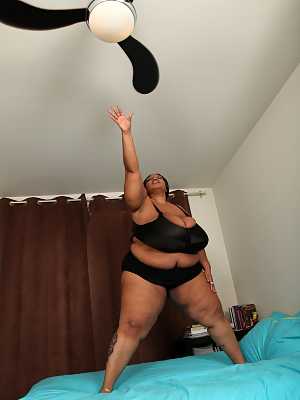 Brunette BBW in black lingerie Cotton Candi exposing her massive saggy tits