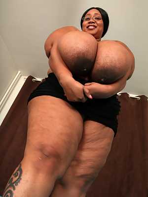 Brunette BBW in black lingerie Cotton Candi exposing her massive saggy tits