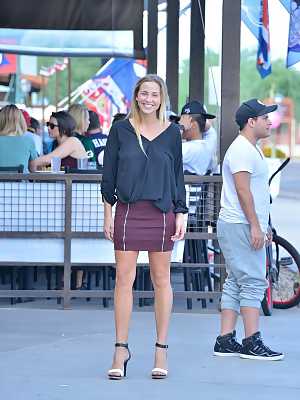 Glamorous blonde in a miniskirt Courtney flaunting her nice tits in public