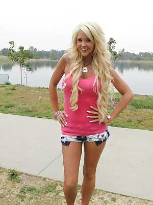 Long legged teen blonde Courtney Tyler posing outdoor in jean shorts