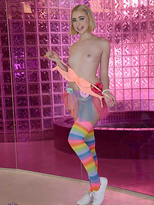 Golden haired teen Chloe Cherry posing topless in her colorful stockings