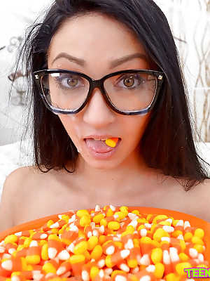 Eating popcorn ends up with some mouth fucking action for a teen in glasses