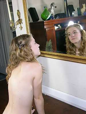 Young looking amateur Dakota B disrobes to go naked around her house