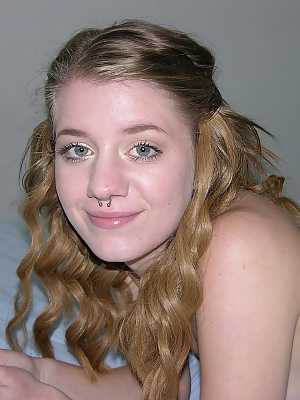 Young looking amateur Dakota B disrobes to go naked around her house