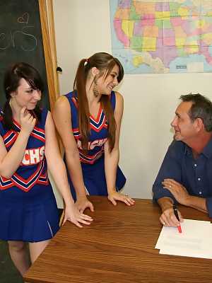 2 cheerleaders jerk off their geography teacher on top of his desk
