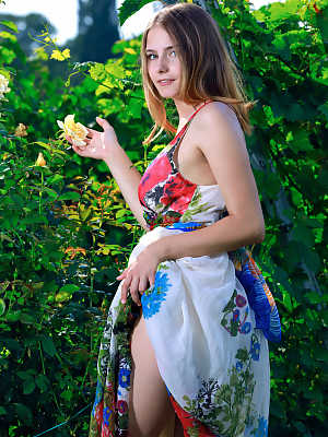 Big titted teen Dakota Pink strips her wonderful dress & poses naked outdoors