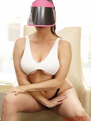 Stunning mature Dana DeArmond unveils her amazing bosom and rubs her clitoris