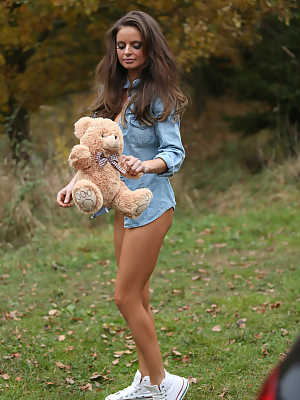 Hot glamour model Dana Harem strips & poses during a fall photoshoot in nature