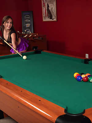 Teen amateur Dani Blu shoots pool before showing her pussy on a futon